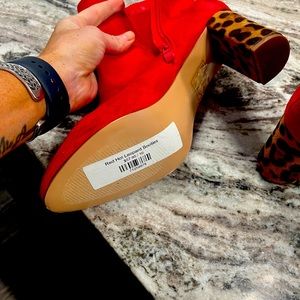 Red booties with leopard heels